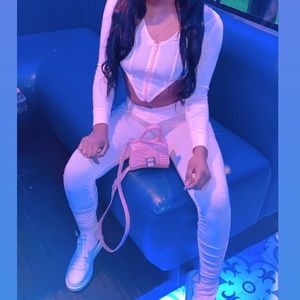 White two piece stacked leggings + cropped jacket.